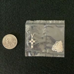 Vintage Avon new in box 925 sterling silver CZ cross pendant necklace.